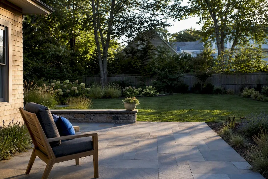 Finished patio beside freshly graded lawn